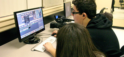 Local high school students editing a short film for the Regional Skills Competition hosted by Durham College