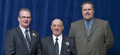 Vaso Vujanovic (centre), 2011 OCAA Hall of Fame inductee accepts his honour from Jay Shewfelt, OCAA president (left), and Ken Babcock, Durham College athletic director during the association's induction ceremony in May. Vaso Vujanovic (centre), 2011 OCAA Hall of Fame inductee accepts his honour from Jay Shewfelt, OCAA president (left), and Ken Babcock, Durham College athletic director during the association's induction ceremony in May.