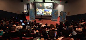 Student in a Durham College auditorium
